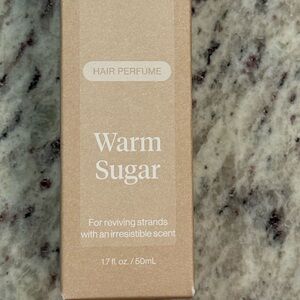 Kitsch Hair Perfume in Warm Sugar.